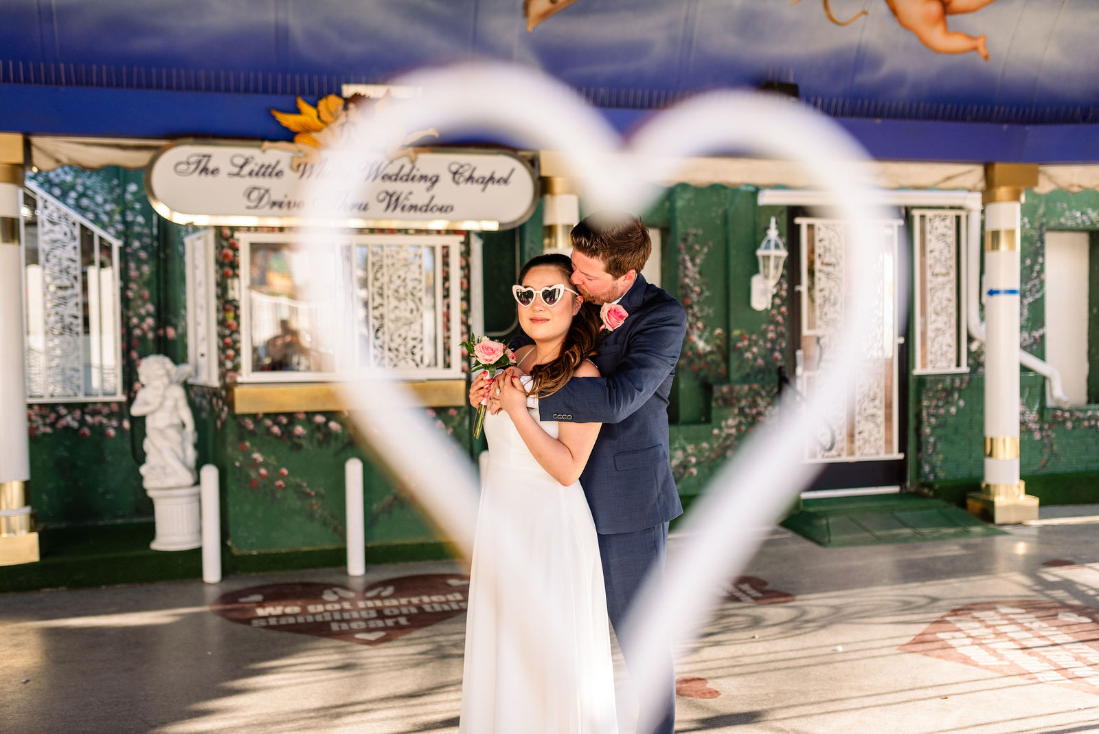 Happy couple at Las Vegas wedding chapel after getting marriage license