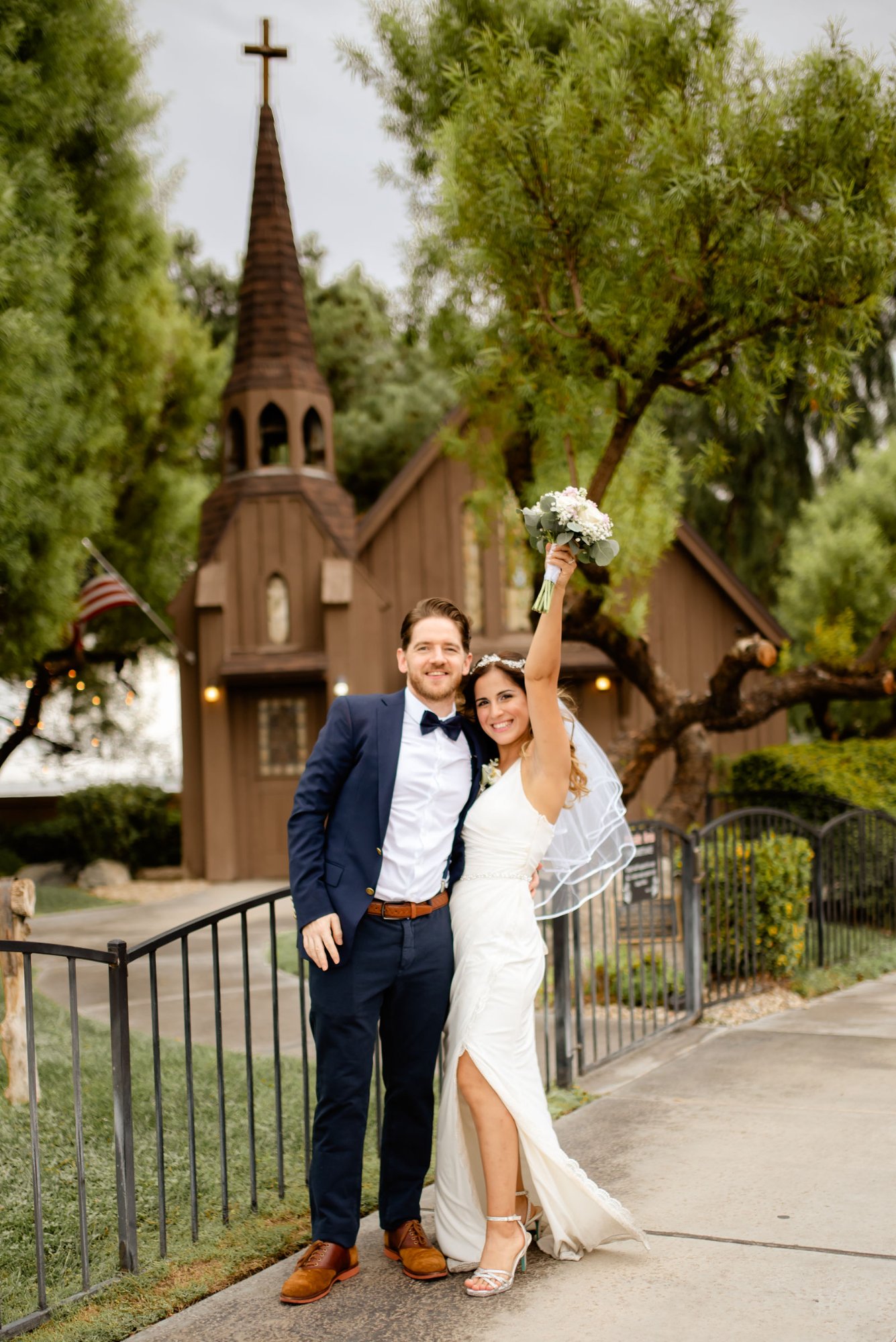 Newlyweds celebrating outside historic Las Vegas chapel