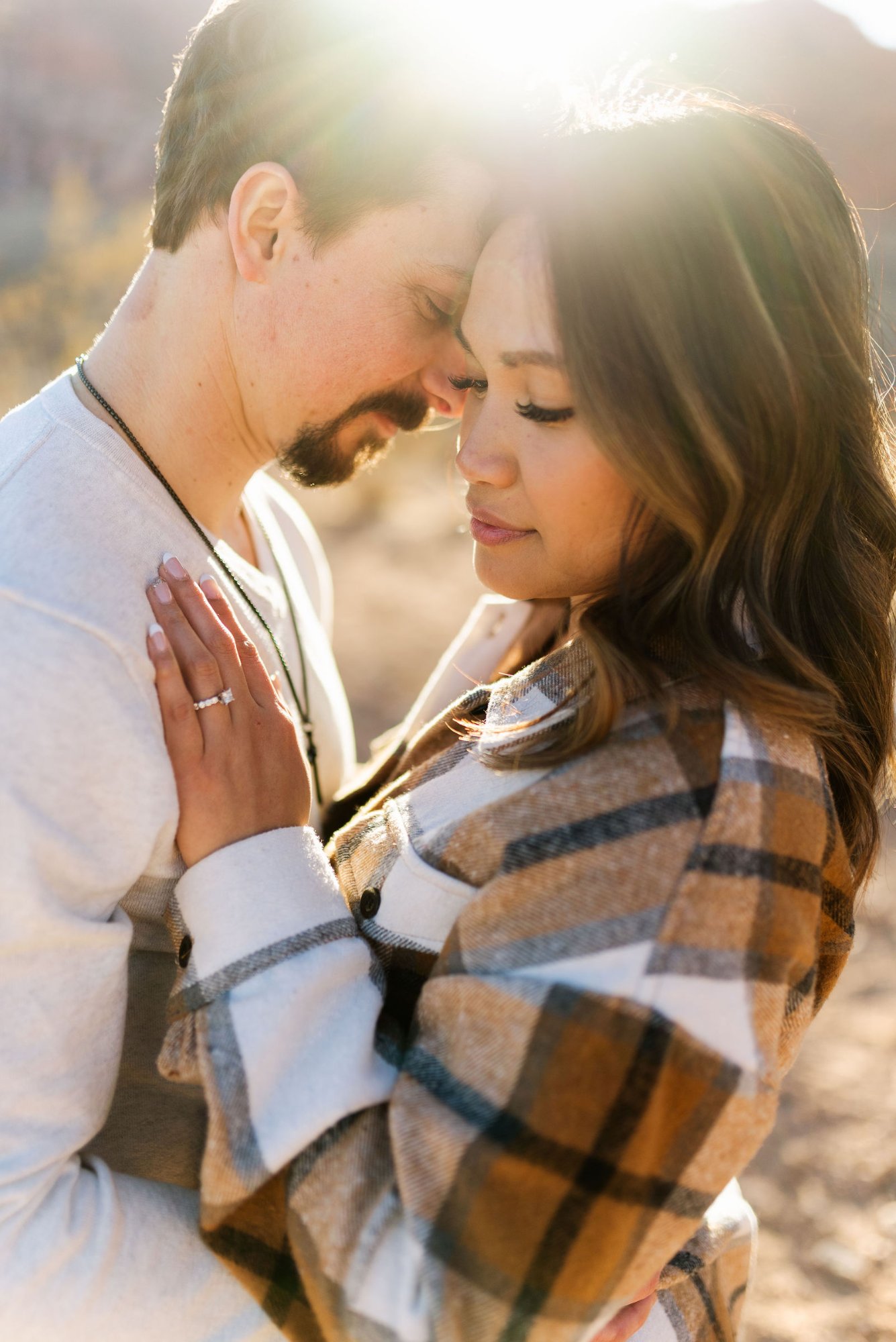 Intimate couple portrait at golden hour in desert